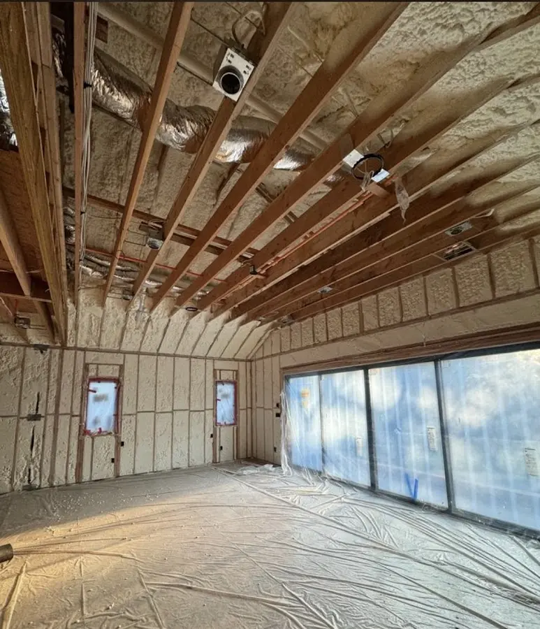 Interior walls and ceiling insulated with spray foam during new construction in Beacon Falls